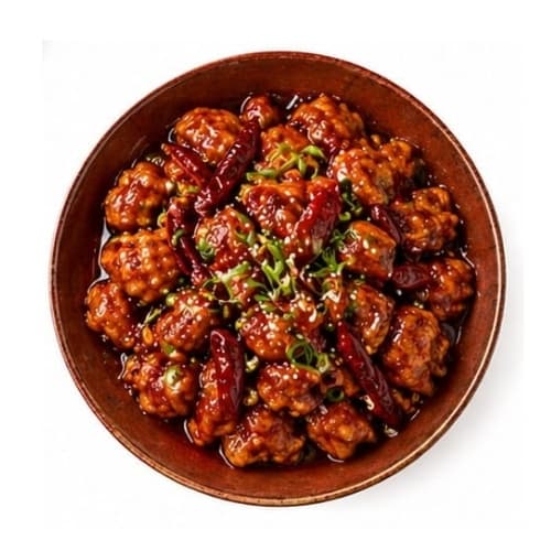 General Tso's chicken in a ceramic bowl