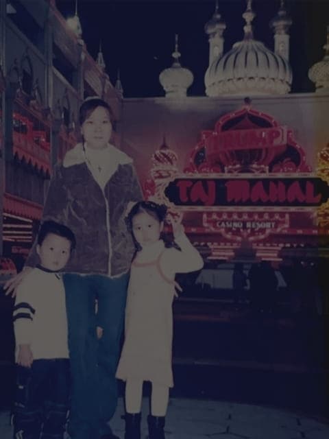 Family photo of the owners' children in front of the Taj Mahal casino